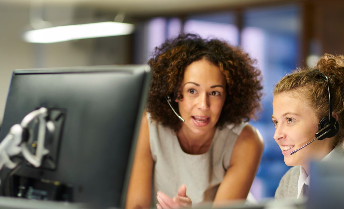 women discussing sales calls