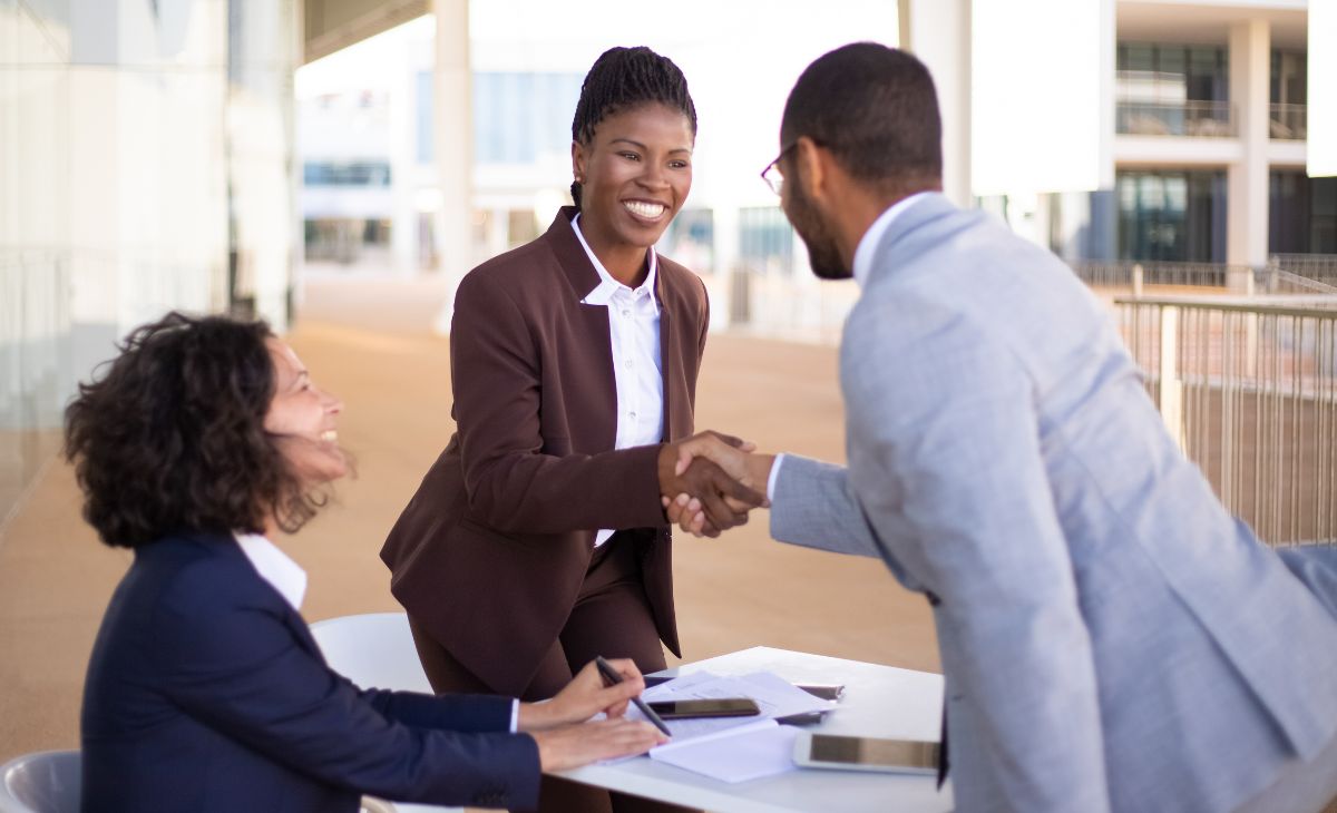 Business professionals shaking hands